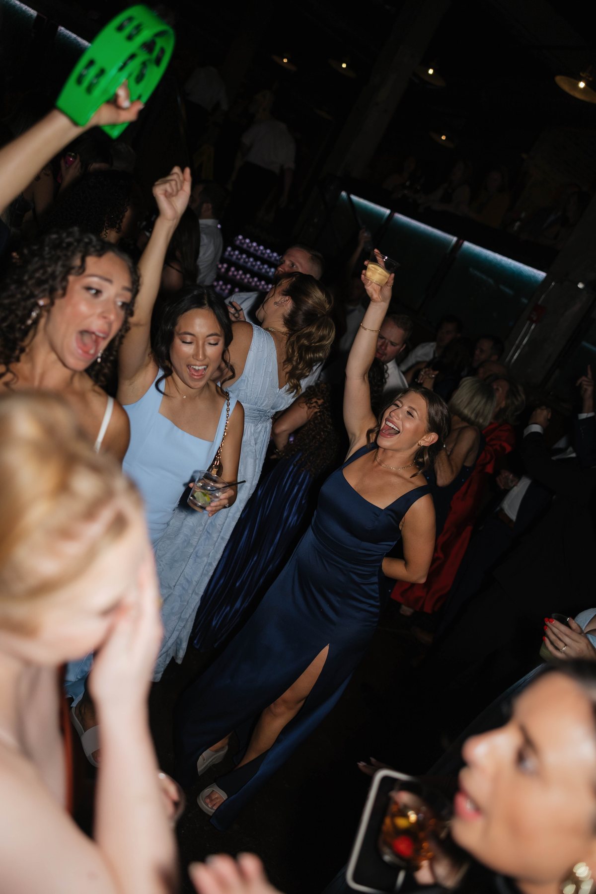 Guests dancing with a tambourine at a Grandstand show